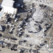 West view of tornado damage of Amazon warehouse