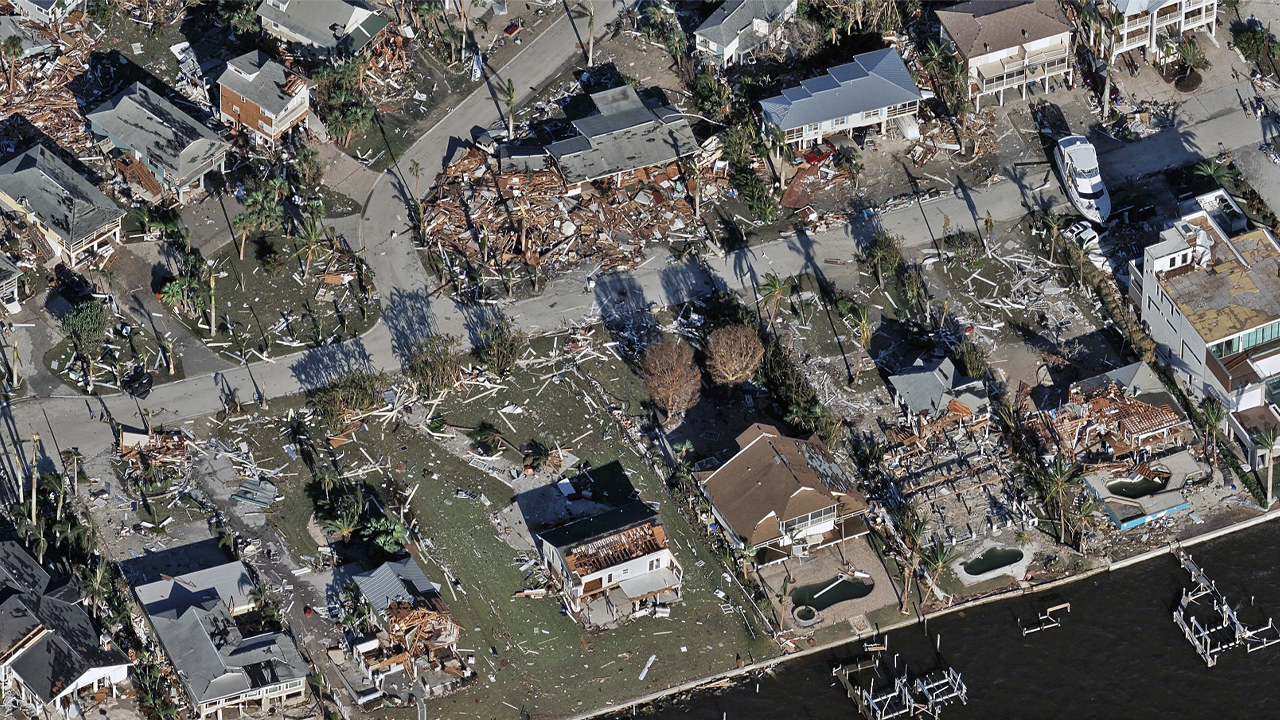 Oblique aerial image of a neighborhood damaged by Hurricane Ian in Fort Myers Beach, FL, published by Vexcel.