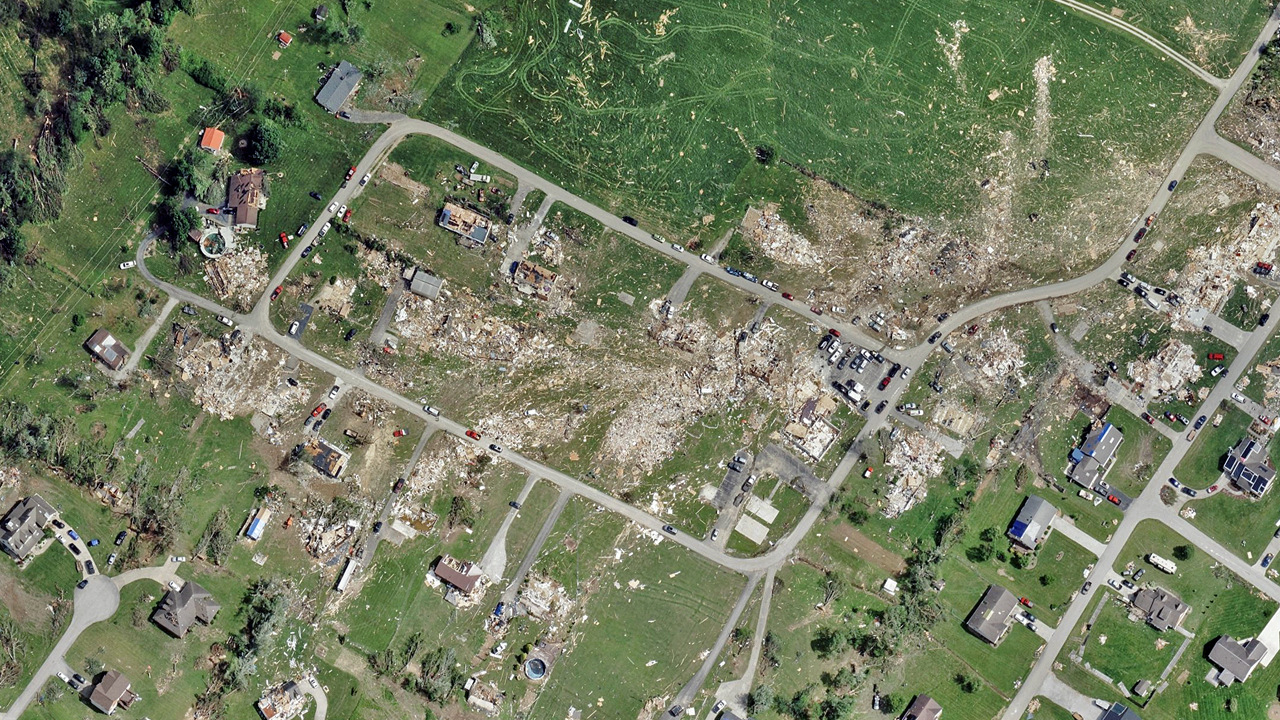 Ortho aerial image of a neighborhood damaged by a tornado in London, KY, published by Vexcel.