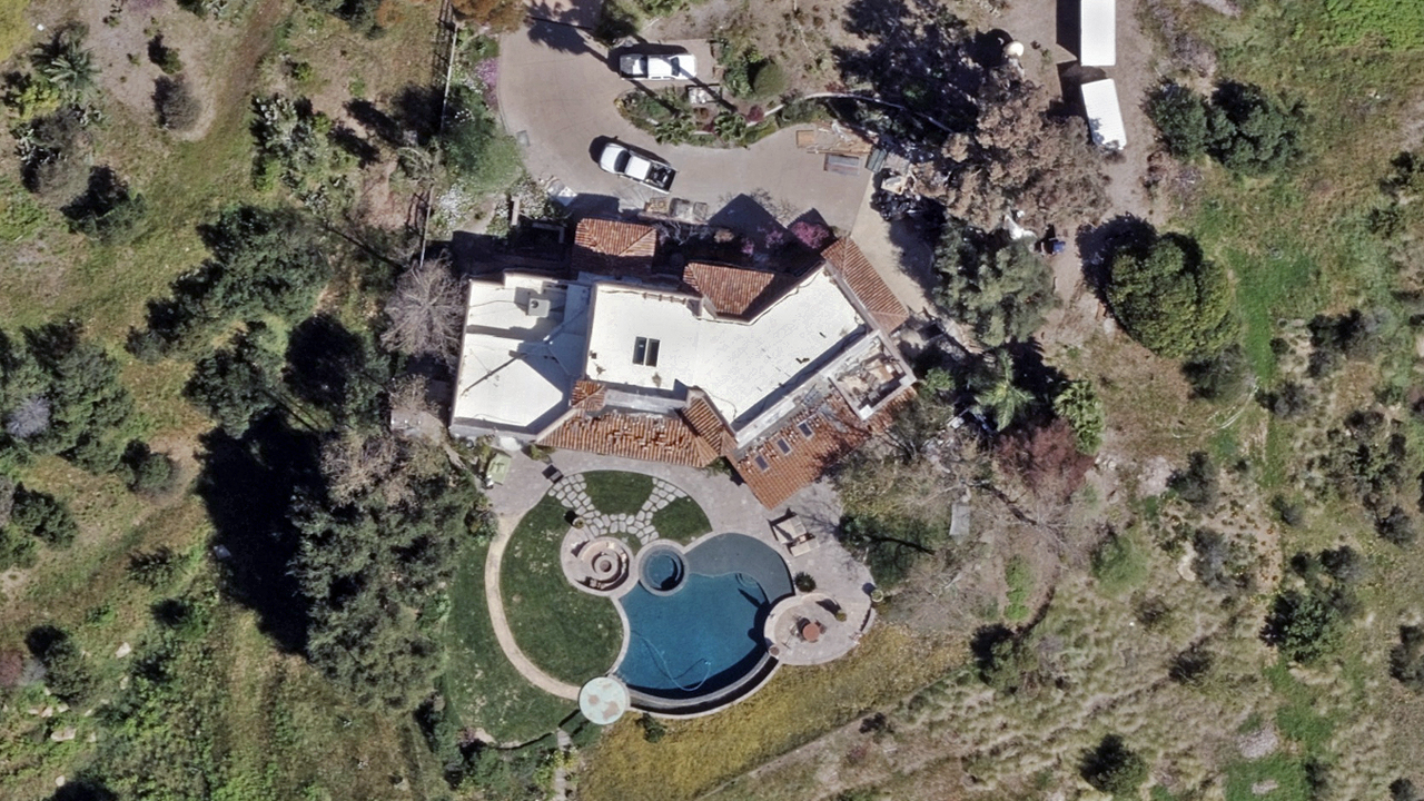 Ortho aerial image of a property before being destroyed by fire in Topanga, CA, published by Vexcel.