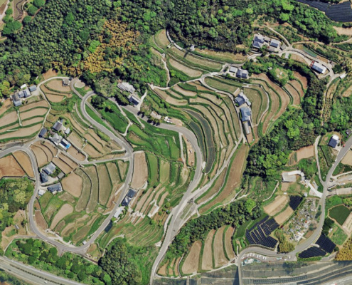 Oblique aerial image of properties and fields in Higashisonogi, Japan, published by Vexcel.