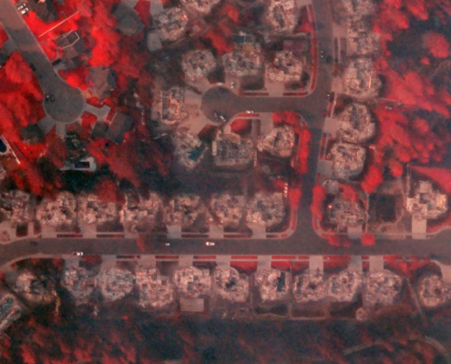 Multispectral aerial Gray Sky image of a fire-damaged neighborhood in Spokane, WA, published by Vexcel.