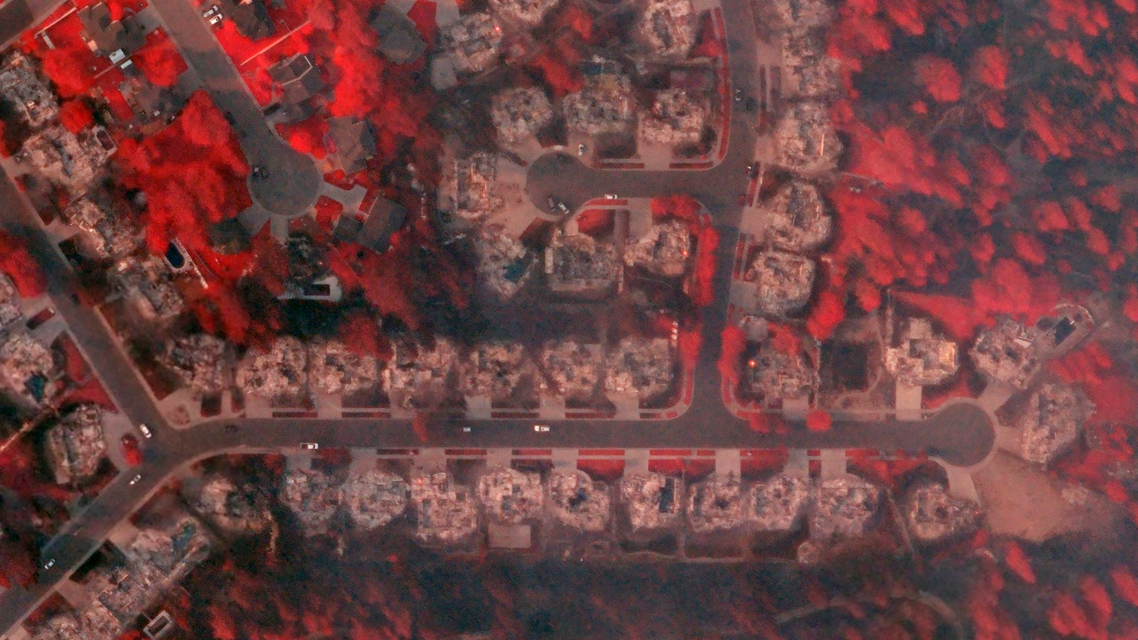 Multispectral aerial Gray Sky image of a fire-damaged neighborhood in Spokane, WA, published by Vexcel.
